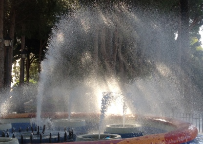 A park fountain takes on a new dimension in the wind